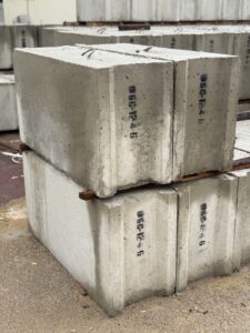 Фундаментные блоки ФБС 12-4-6 на складе завода железобетона